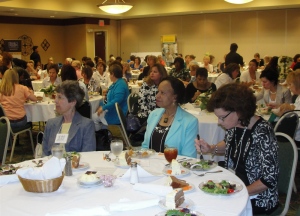 Female business leaders listen to U.S. Sen. Kit Bond speak at a recent Women's Business Conference in Columbia.
